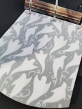 Halloween mini scrapbook album vellum page against ghost patterned paper