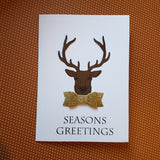 Christmas greeting card - stag with bow